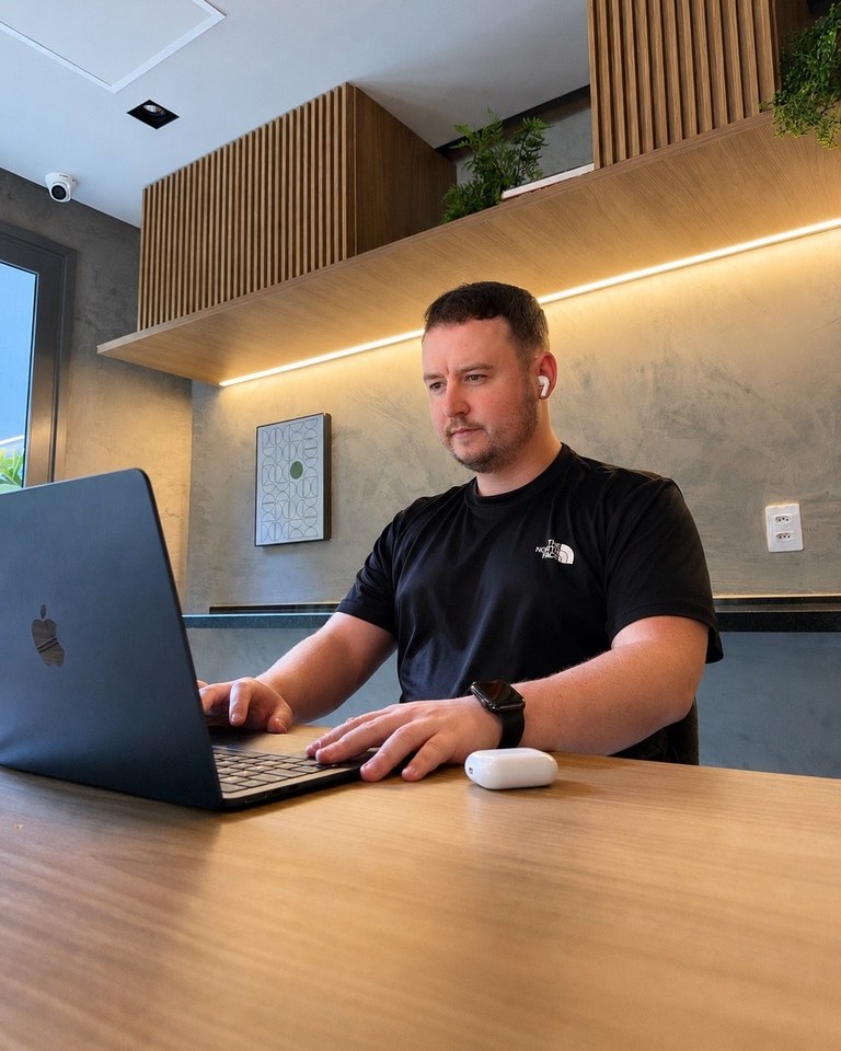 Layton Weatherall working at a laptop